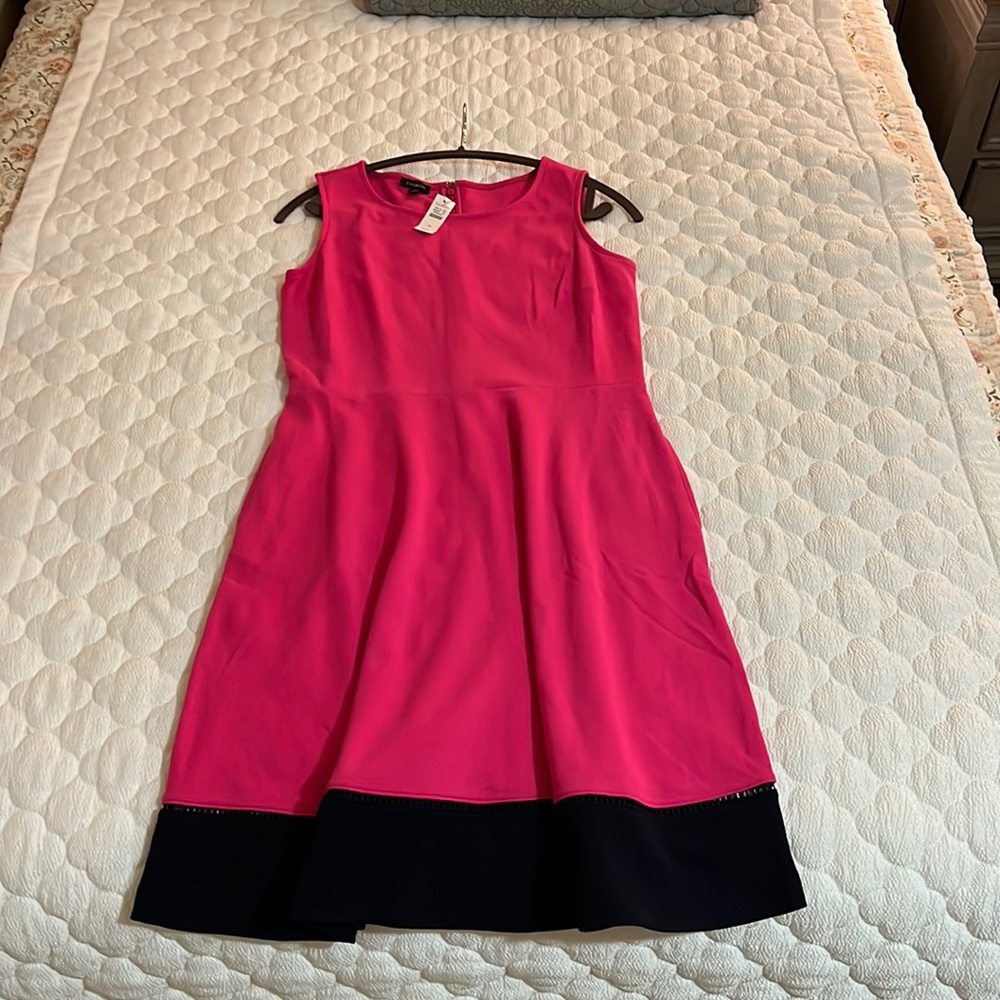 It is a Tal-boot dress. It is size M. New One